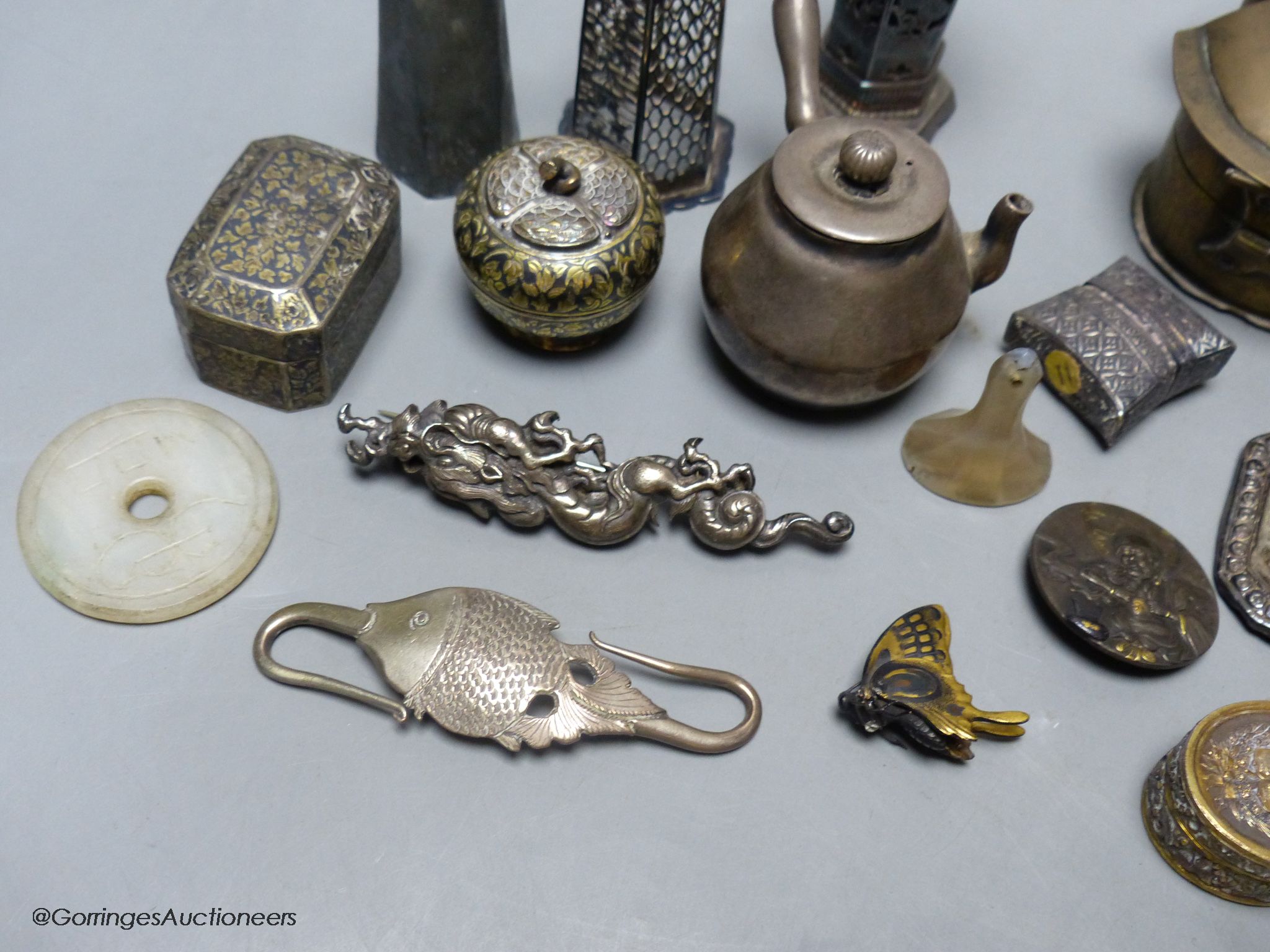 A group of Asian and other small collectables, white metal, brass, jade etc.